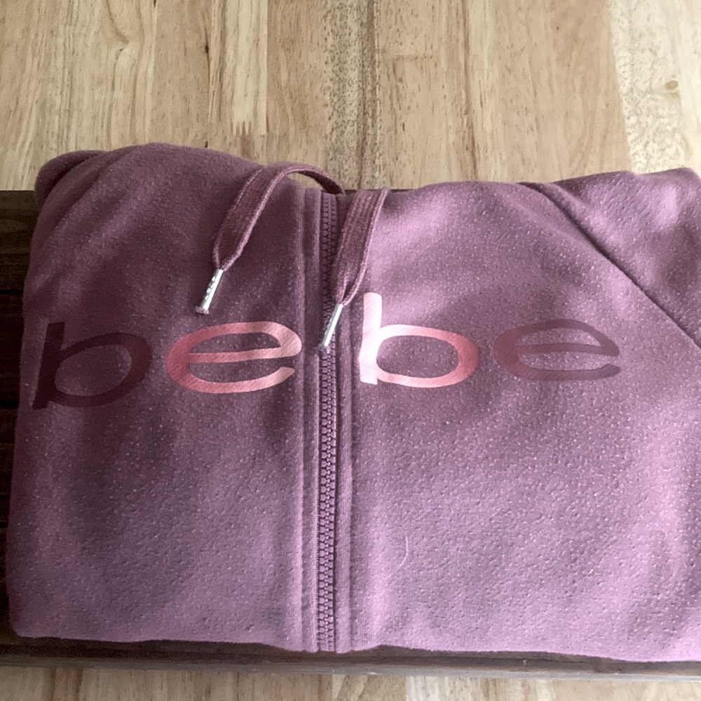 “bebe sport” zip up sweater.